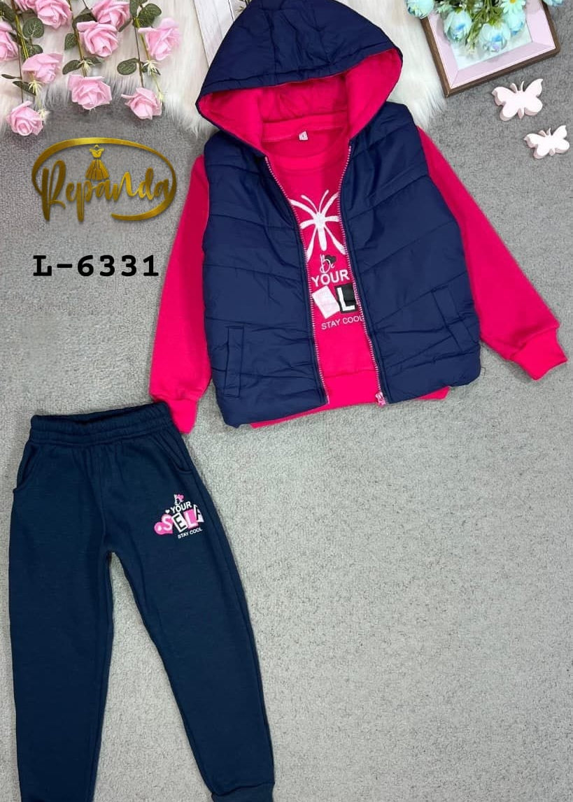 Navy and pink children's tracksuit with floral decorations in the background