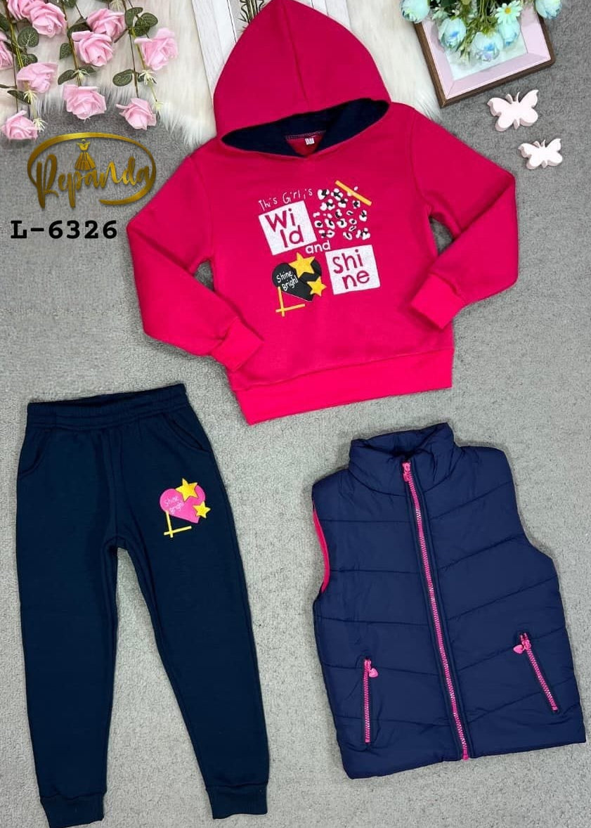 Pink hoodie, navy pants, and blue vest set on a gray surface with decorative elements.